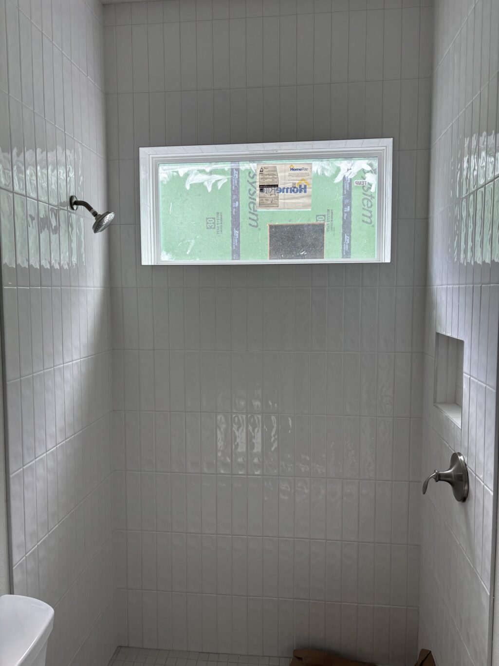 "Custom marble shower installation Jacksonville FL" or "Natural stone wall tile shower St. Augustine."