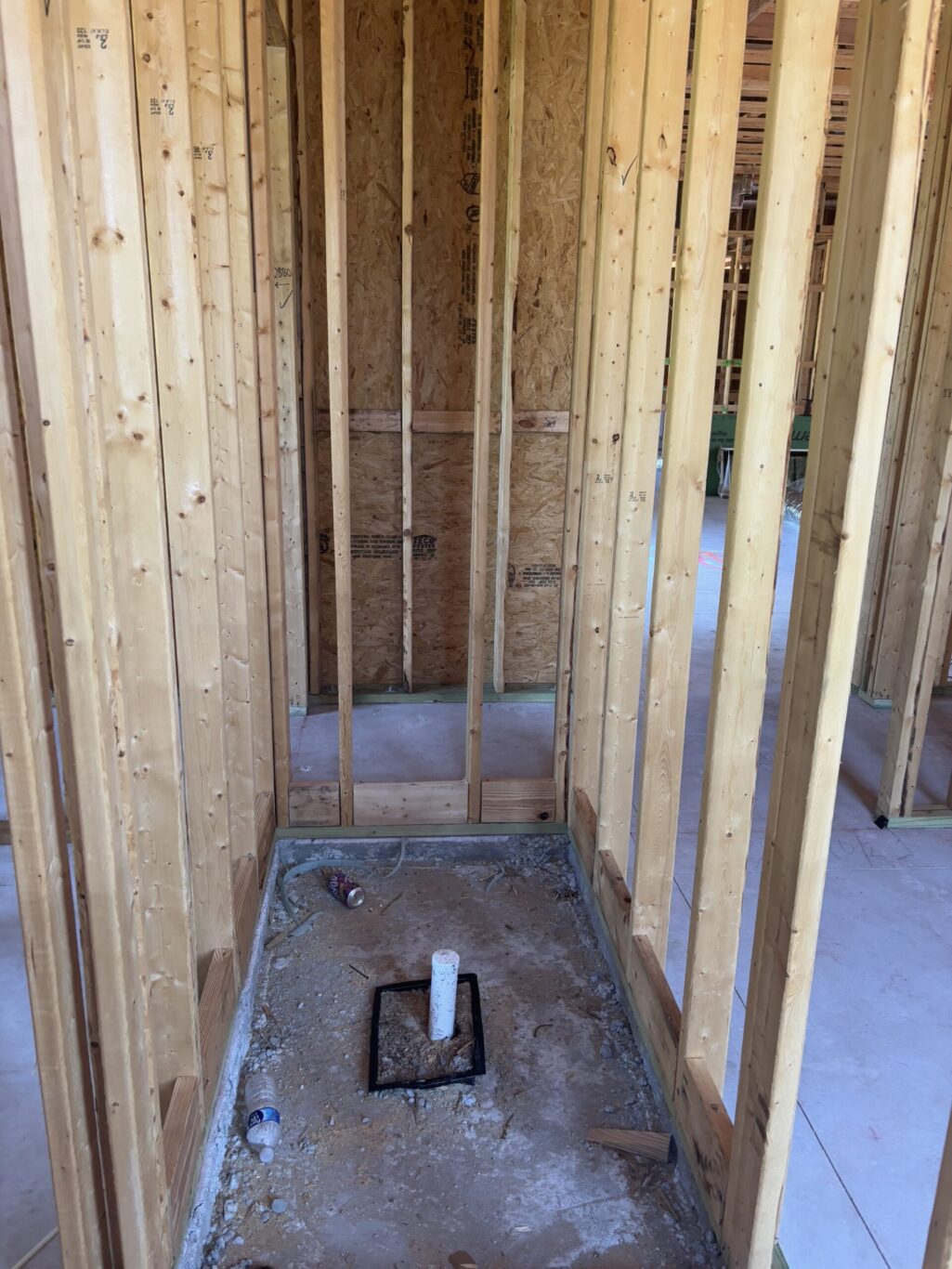 "Mandatory 24 hour water flood test on a newly installed shower pan liner to check for leaks"
